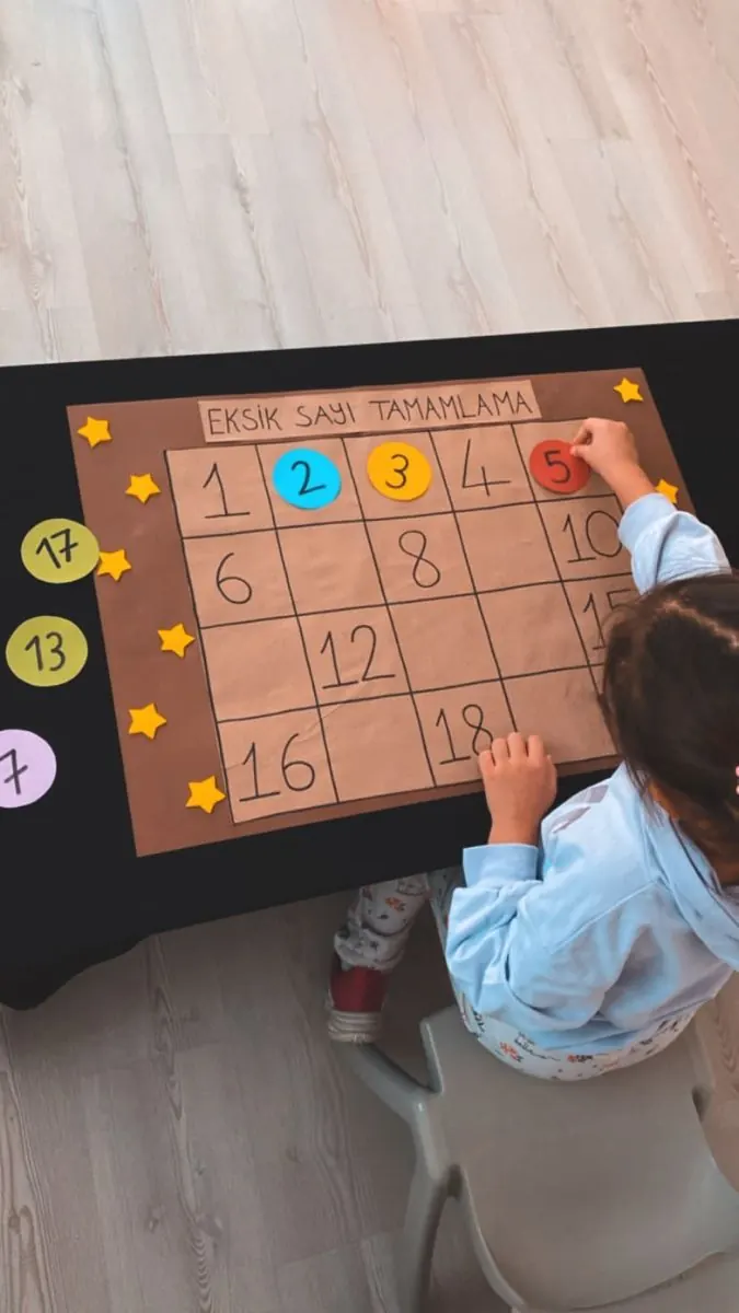 A child working on a number completion activity
