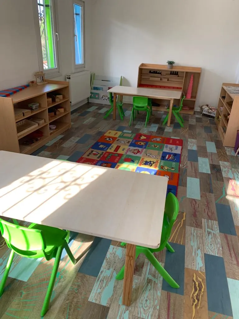 Montessori materials on open shelves in the classroom
